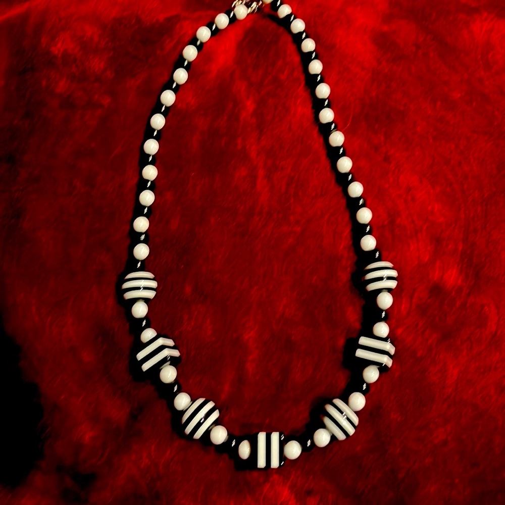 Necklace with black and white beads.